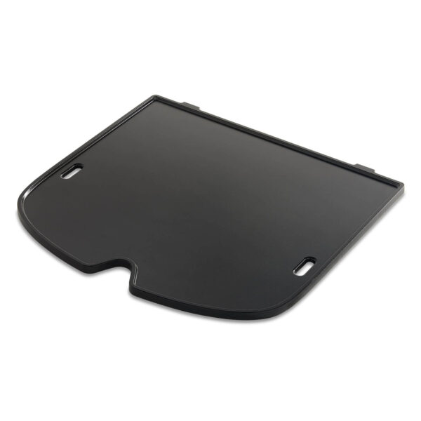 Plancha Traveler de hierro colado vitrificado con superficie antiadherente para barbacoas Weber Traveler.