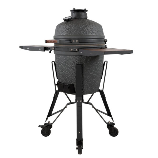 Vista lateral del Kamado VX Medium con la tapa cerrada y mesas auxiliares desplegadas.