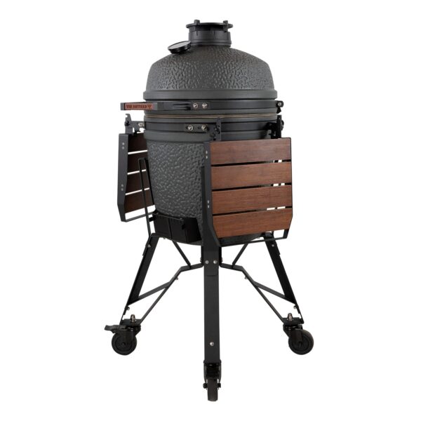 Kamado VX Medium con mesas auxiliares plegadas y tapa cerrada.