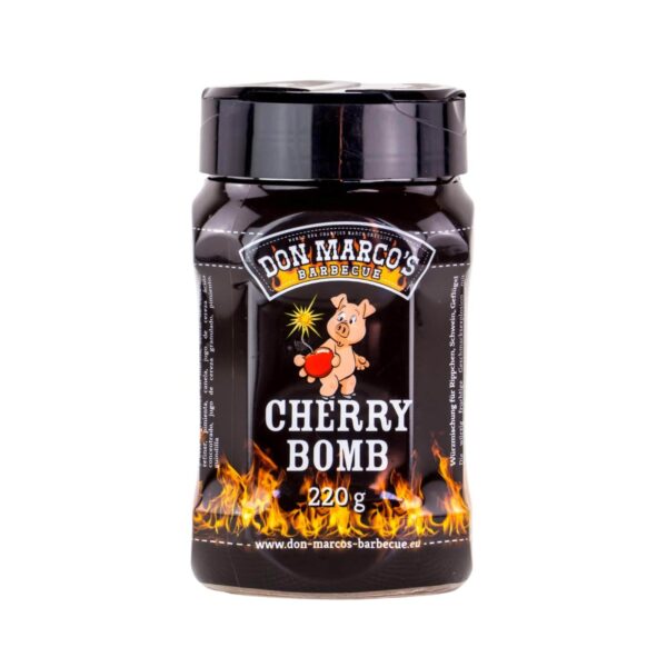 Envase de mezcla de especias Cherry Bomb de 220 g, ideal para barbacoa, con diseño llamativo de fuego y un cerdito caricaturesco sosteniendo una cereza.