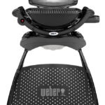 Barbacoa Weber Q 1000 con soporte y tapa cerrada de aluminio colado.