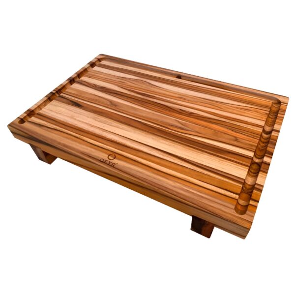 Tabla de cortar Ofyr de madera de teca con hendidura perimetral para recolección de jugos.