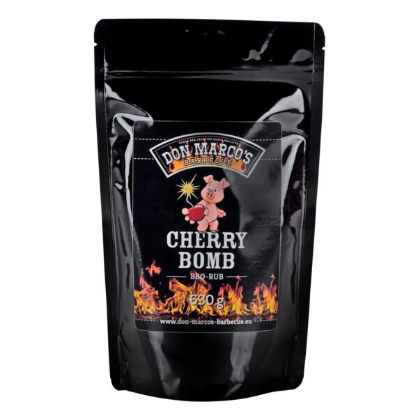 Bolsa de 630 gramos del rub para barbacoa Cherry Bomb de Don Marco’s Barbecue, con diseño negro, logotipo colorido y llamas decorativas en la parte inferior.