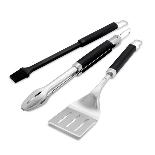 Kit de utensilios de barbacoa Weber compuesto por brocha de silicona, pinzas con mecanismo de bloqueo y espátula con borde biselado