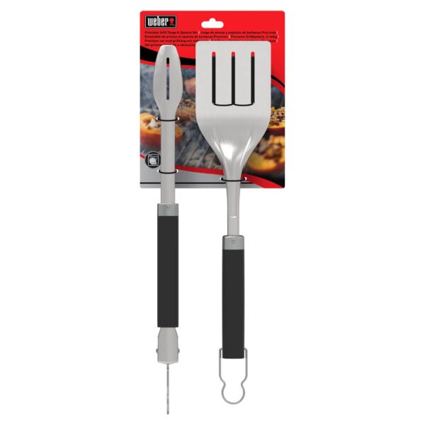 Set de espátula y pinzas Precision de Weber en acero inoxidable con mango antideslizante, presentado en su empaque original.