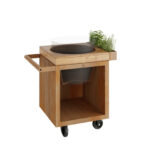 Kamado OFYR table model 65 in corten steel with teak top and herb compartment.