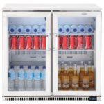 Two-door Beefeater fridge with illuminated interior, stocked with cold drinks such as water, soft drinks and beer.