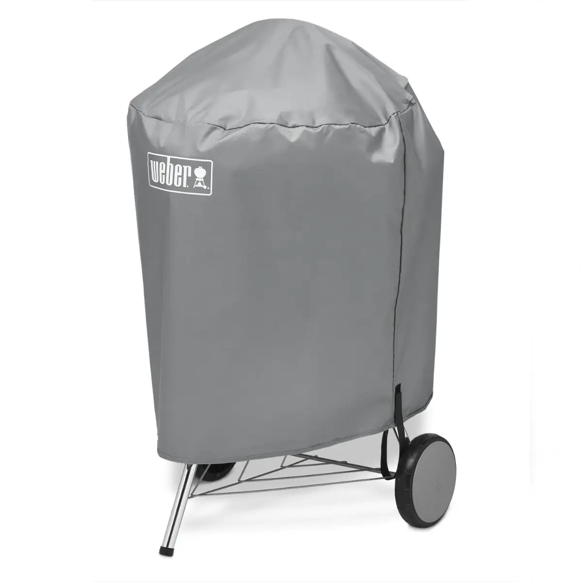 Funda protectora colocada sobre una barbacoa Weber de carbón de 57 cm